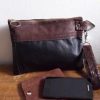 lederen clutch bruin